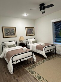 Very comfortable 2nd bedroom with a small desk just outside of photo range