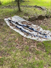 Inflatable laying in the yard, unusable.