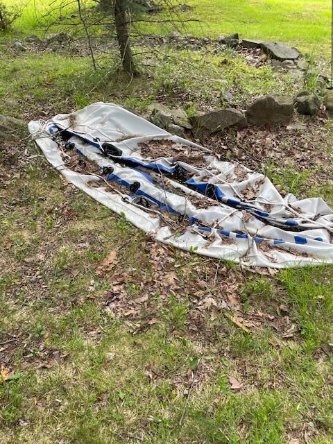 Inflatable laying in the yard, unusable.