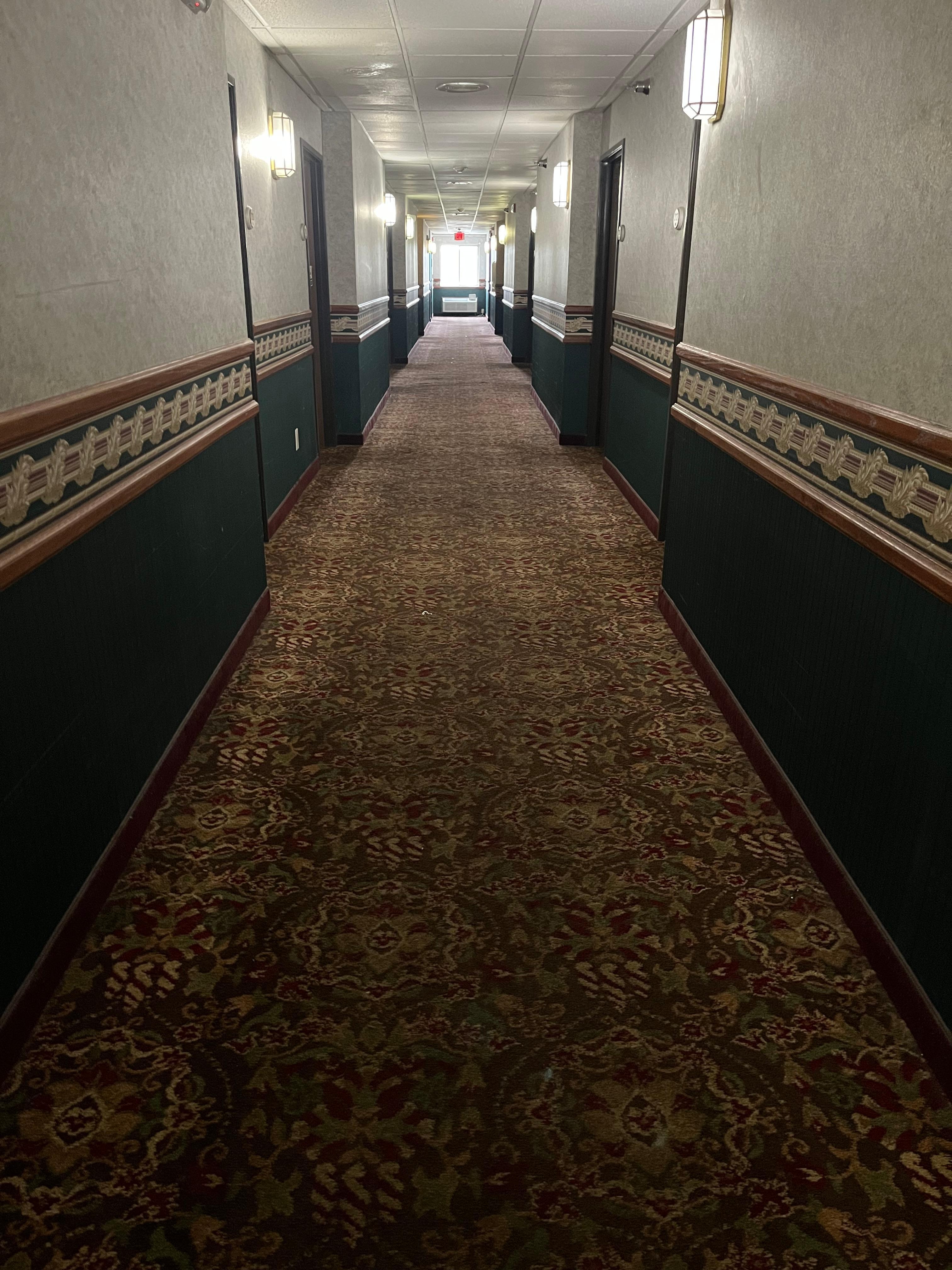 Creepy, outdated hallway that smells of old cigarette smoke