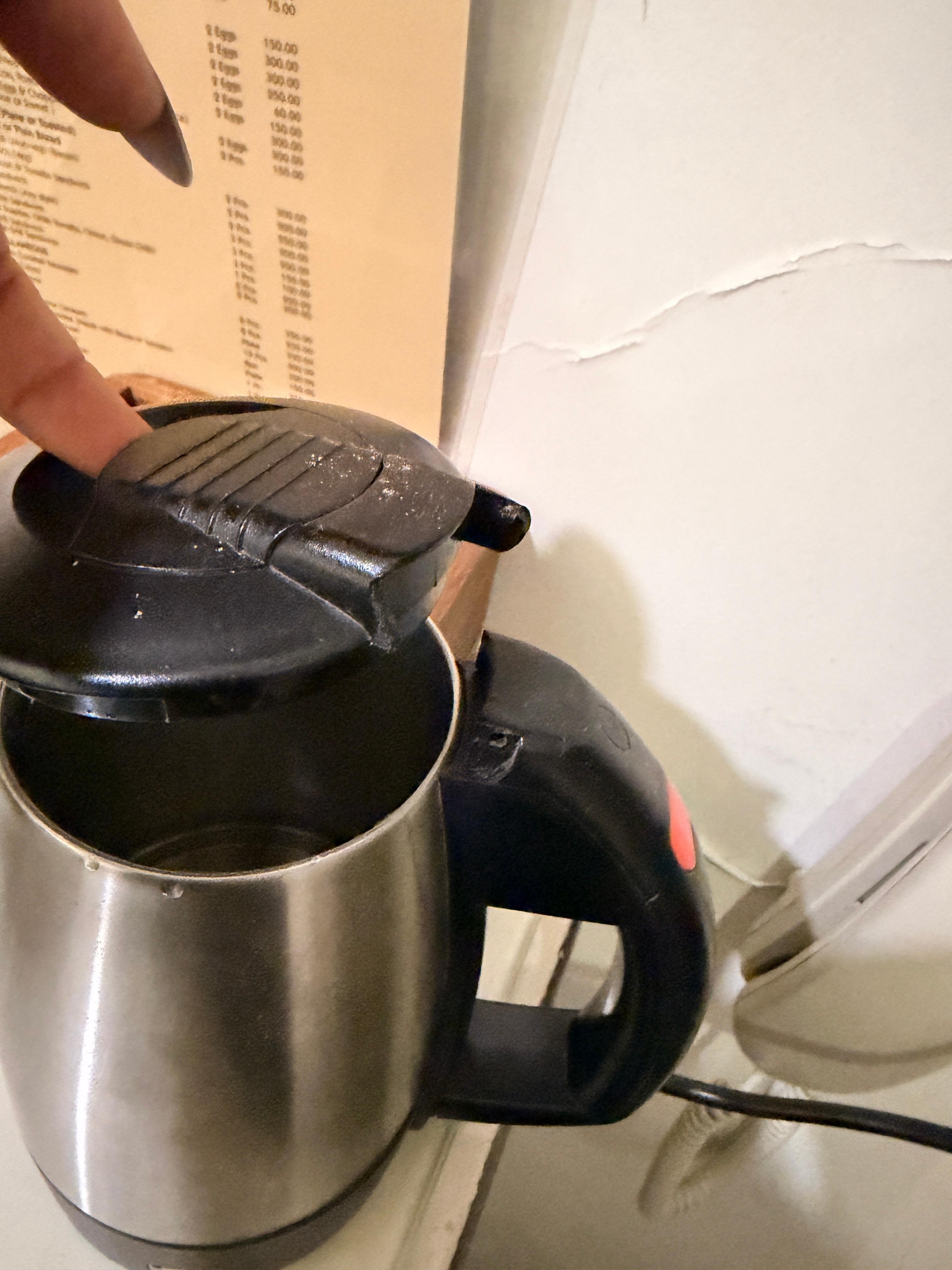 Rusty and dingy old kettle