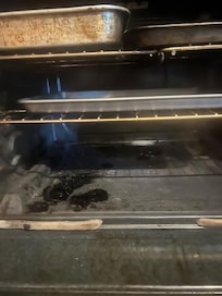 Dirty stove that caught fire when cooking