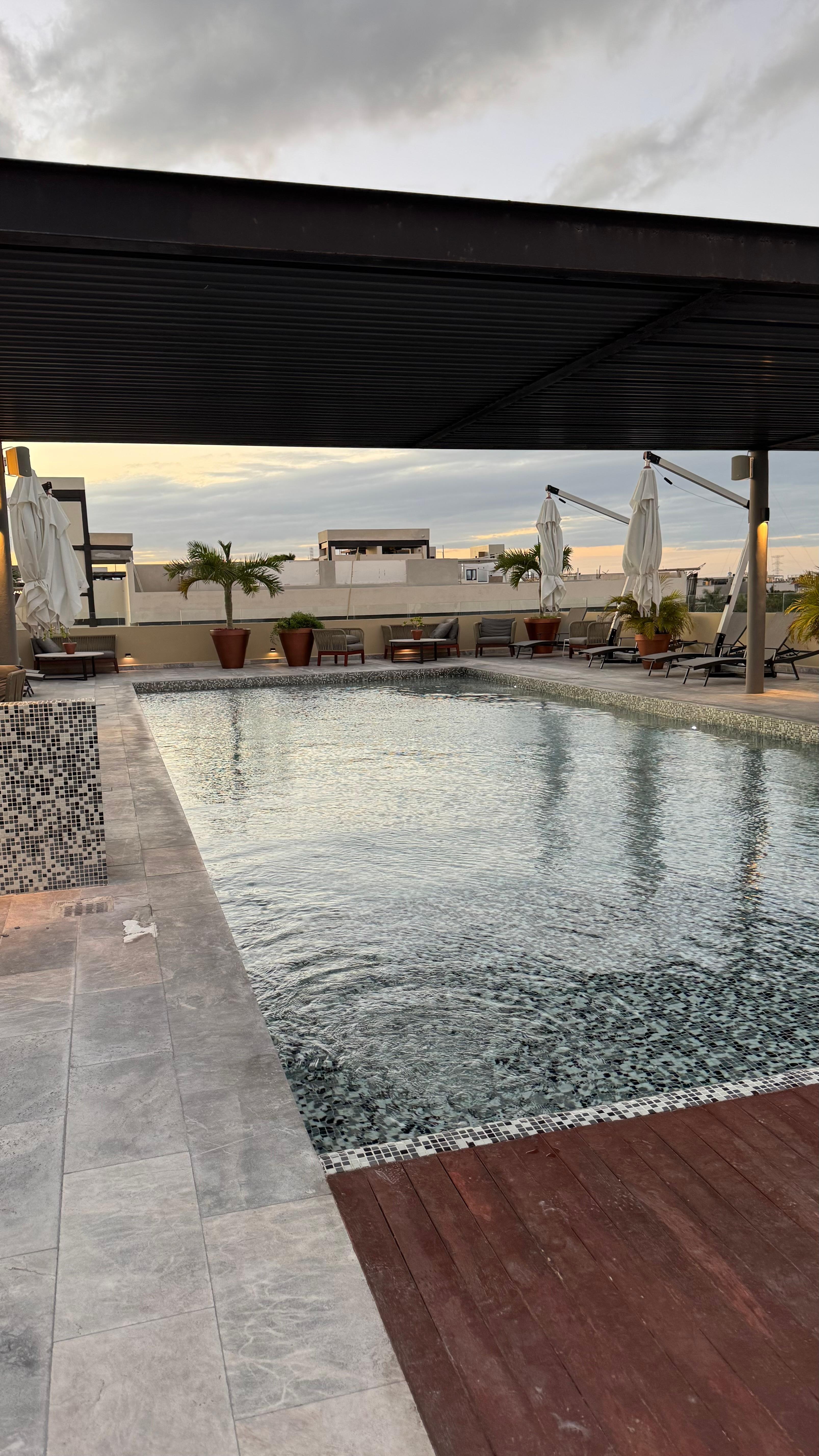 Pool with lots of seating and shade