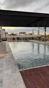 Pool with lots of seating and shade