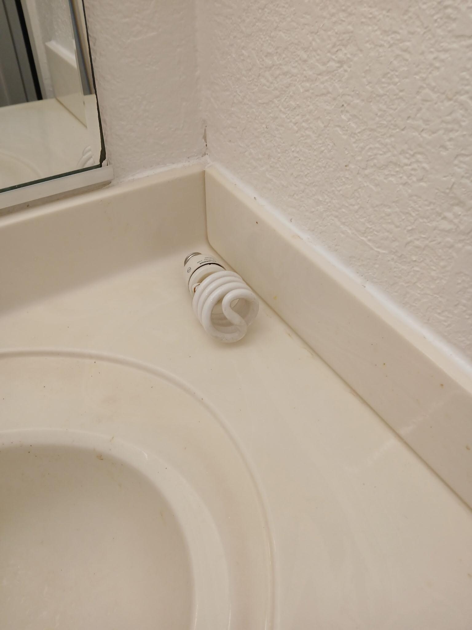Broken light bulb on counter