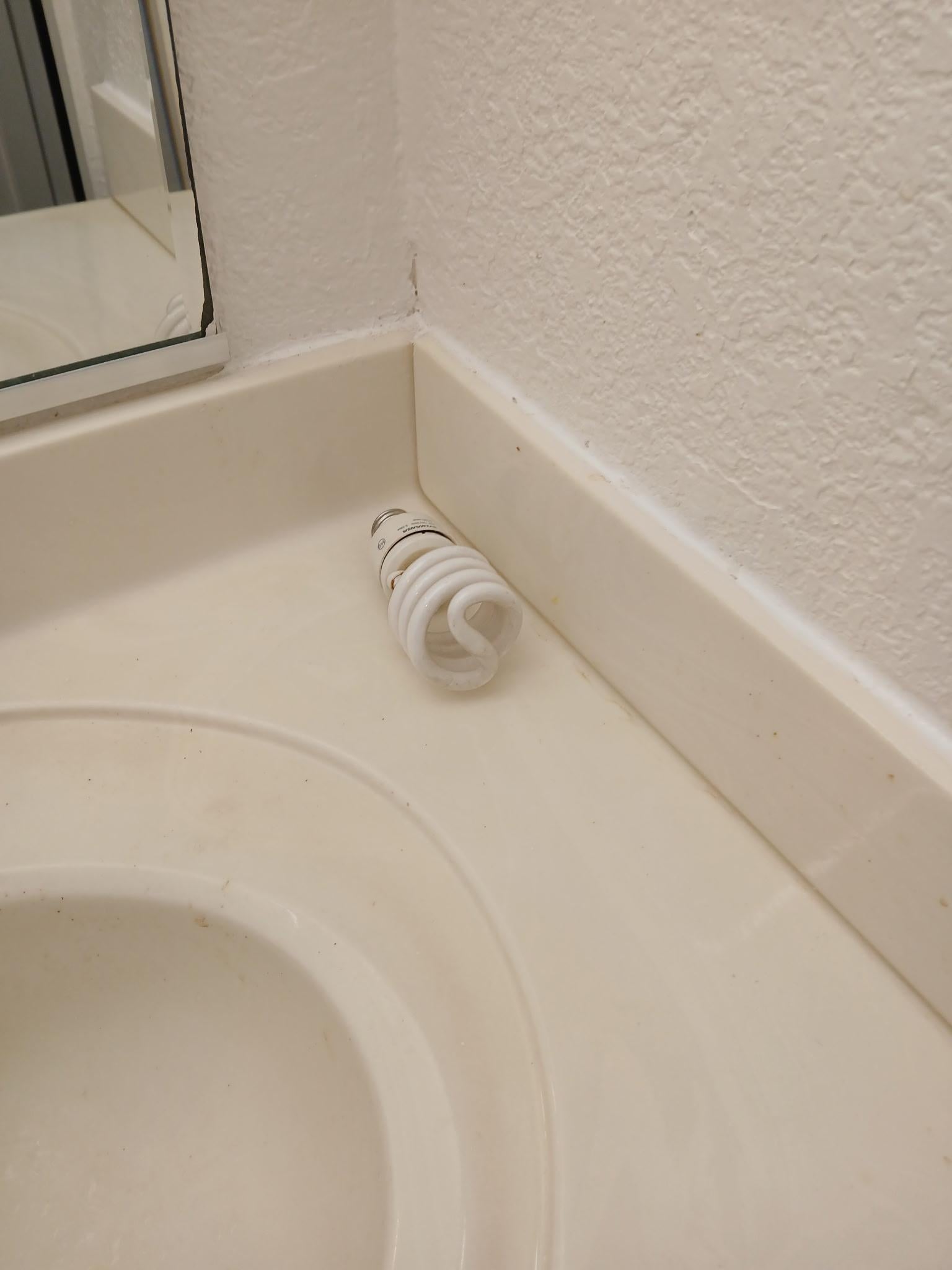 Broken light bulb on counter