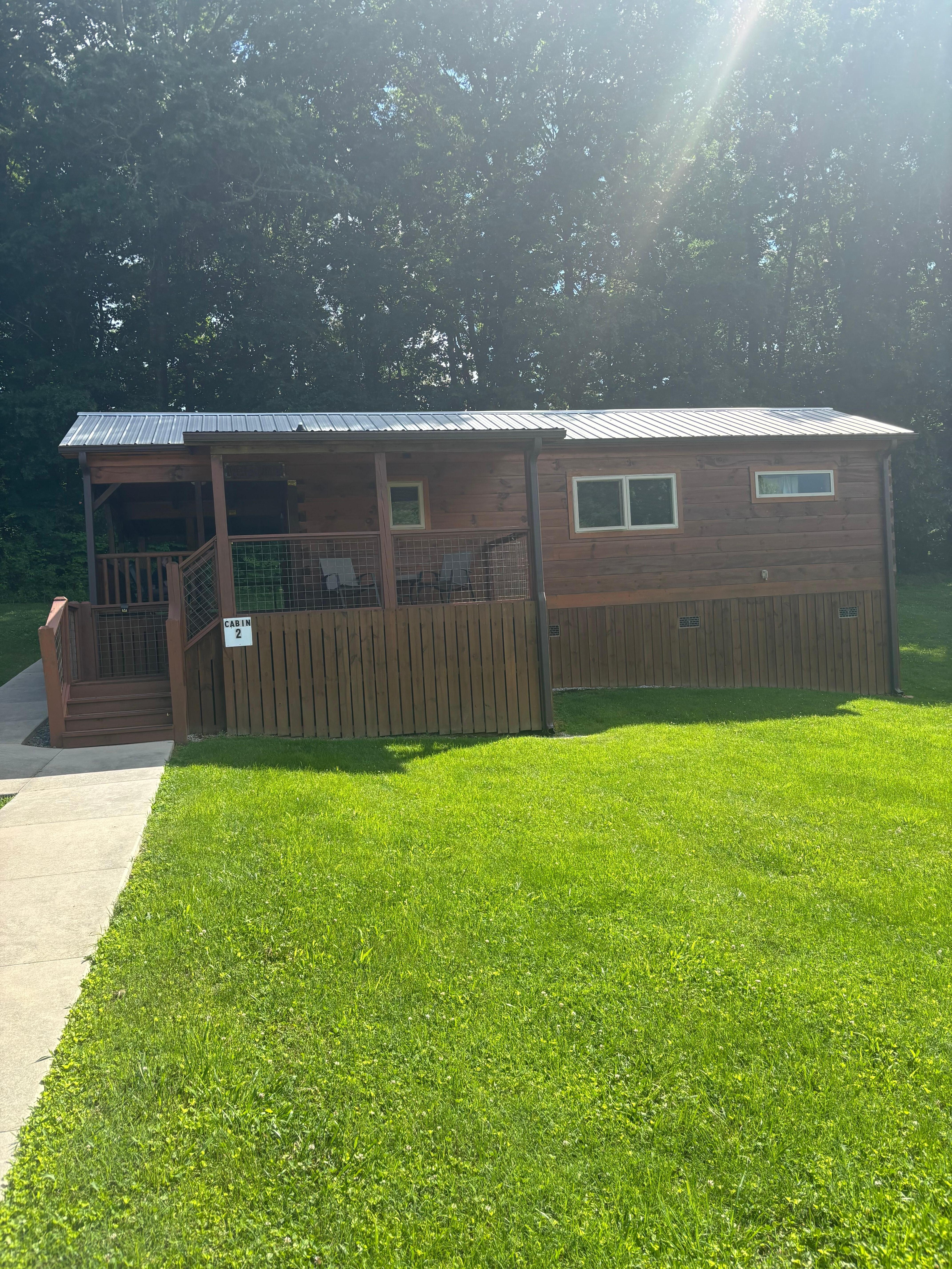Walkway up to beautiful cabin . Easy walk 