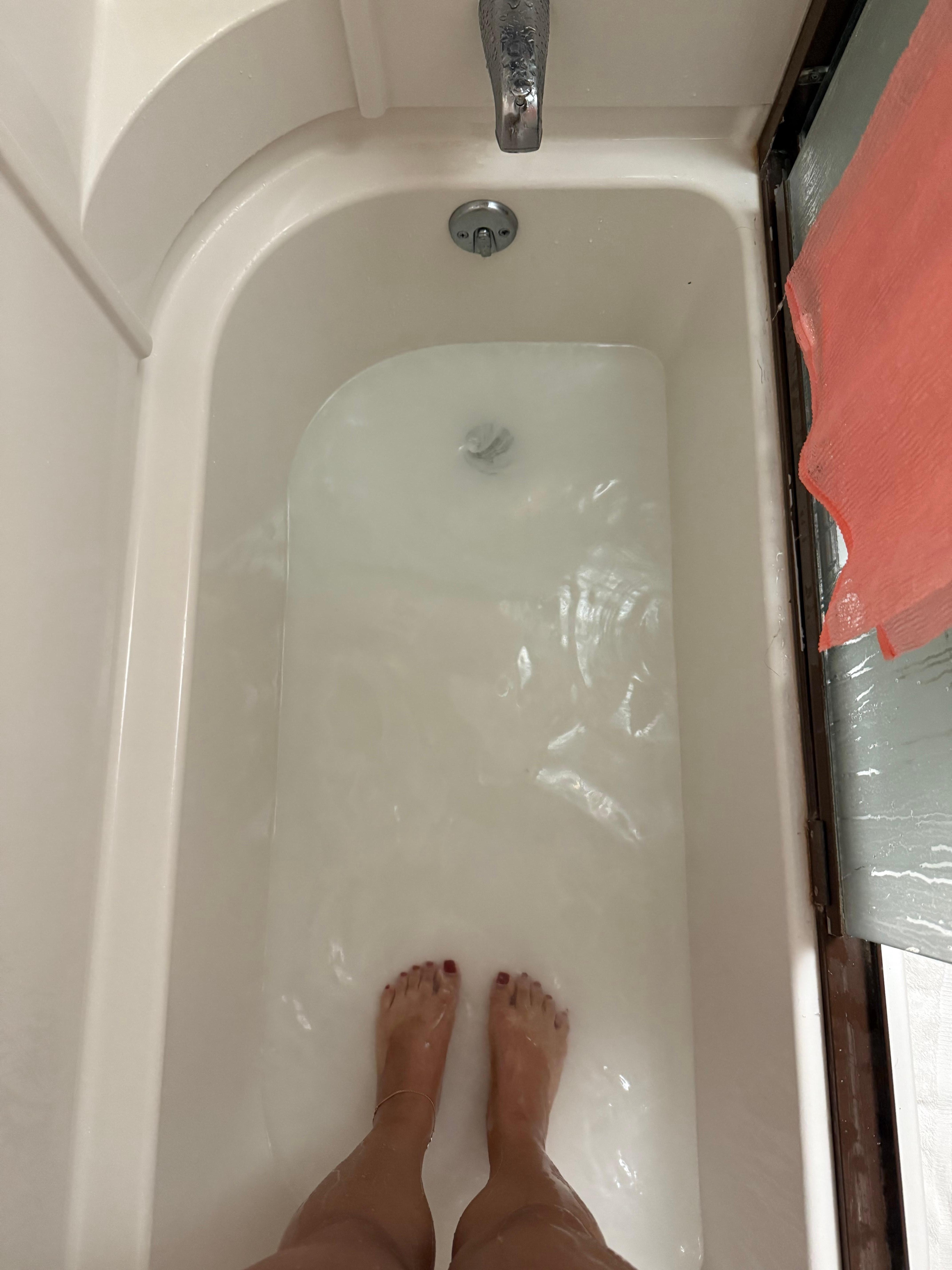 Clogged shower drain full of hair from previous renters 