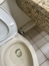 Bench next to toilet