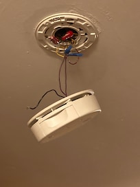 Smoke detector- not sure how they pass inspection. A tragedy(and probable lawsuit waiting to happen).