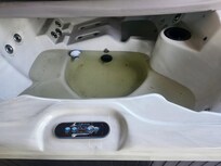 Pic of hot tub when we tried to use it. Before I messaged the owner who said it would be cleaned and filled.