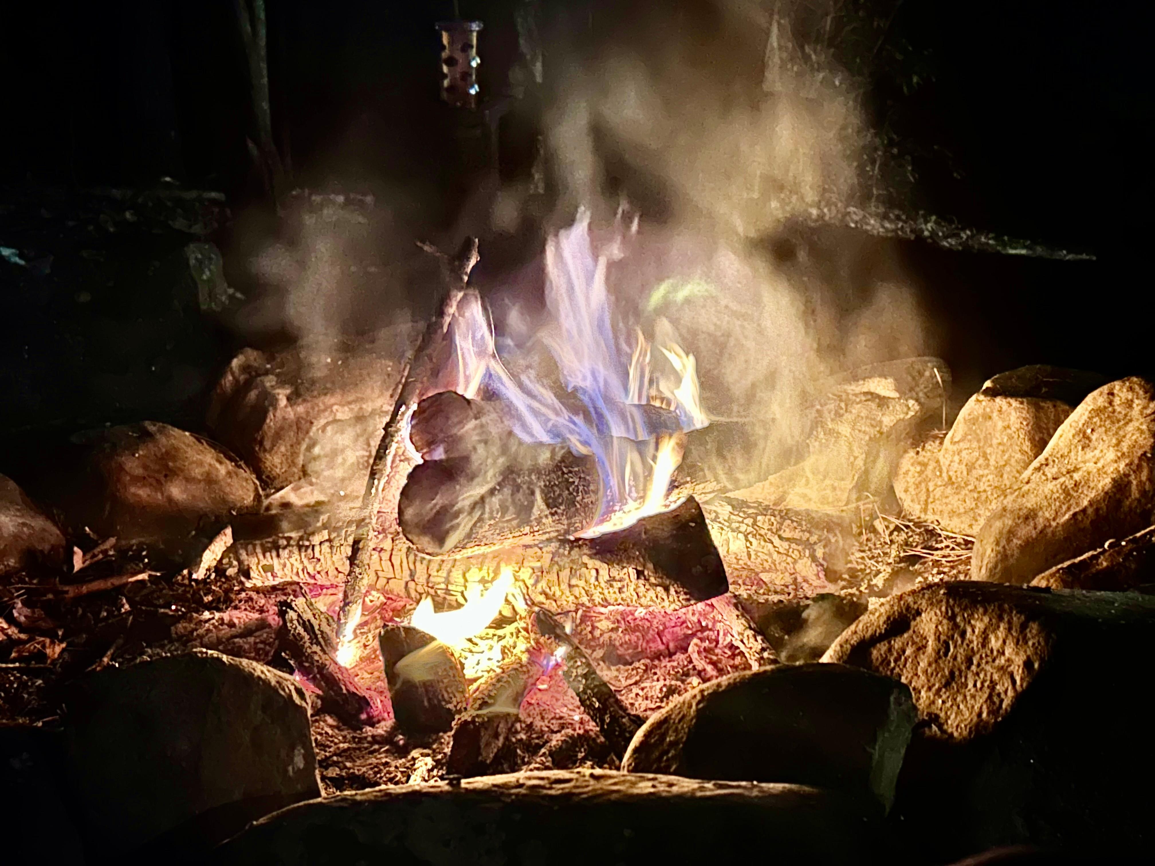 Beautiful fire for roasting marshmallows outside in the fire pit.