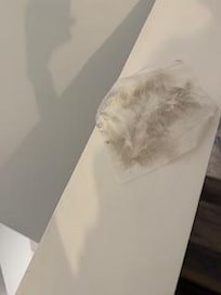 Surfaces dirty. White cloth after we wiped