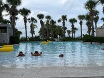 Zero entry lazy river access