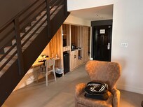 Kitchenette area with microwave and mini fridge.