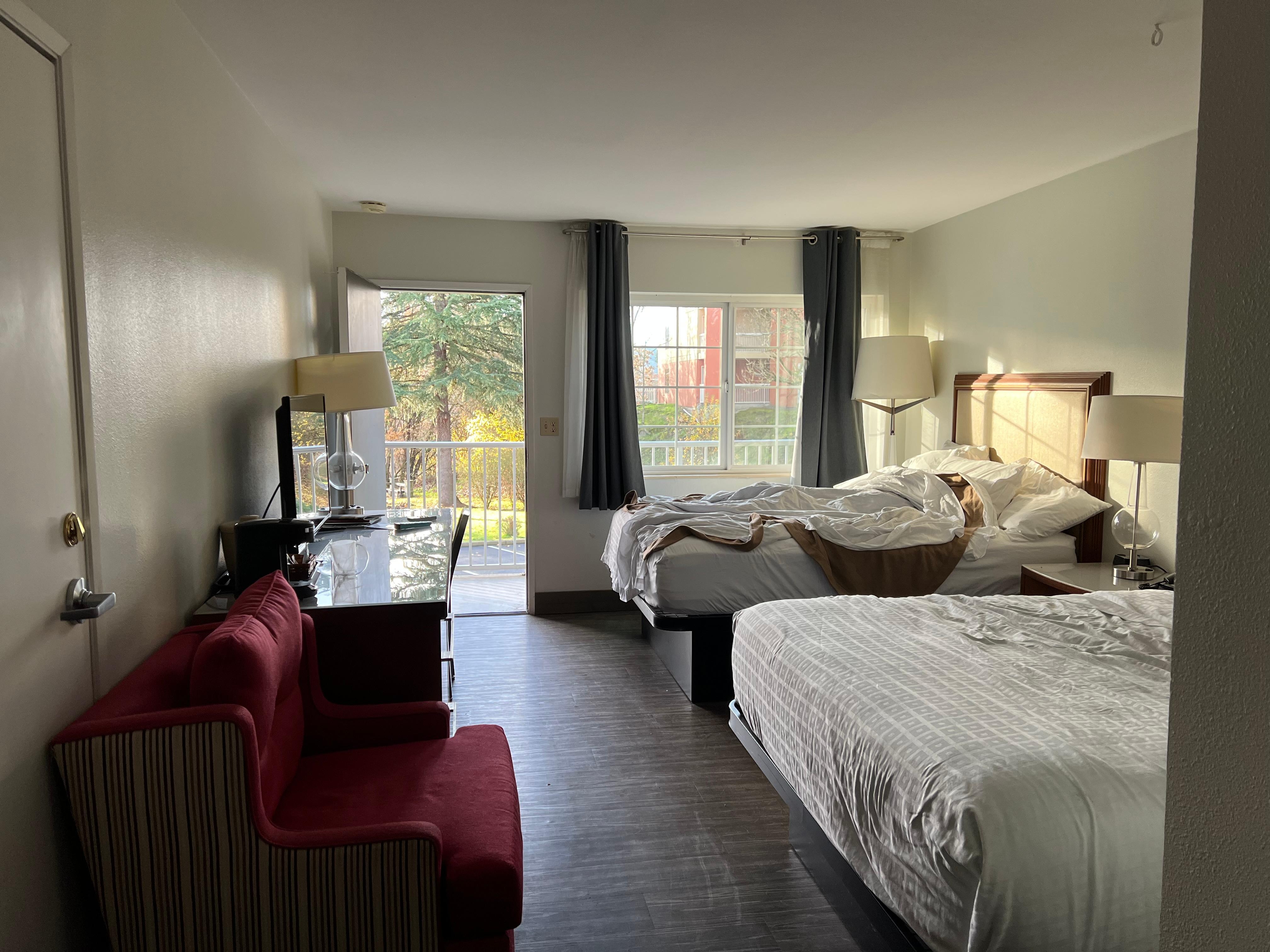 Looking into the room and out at the balcony