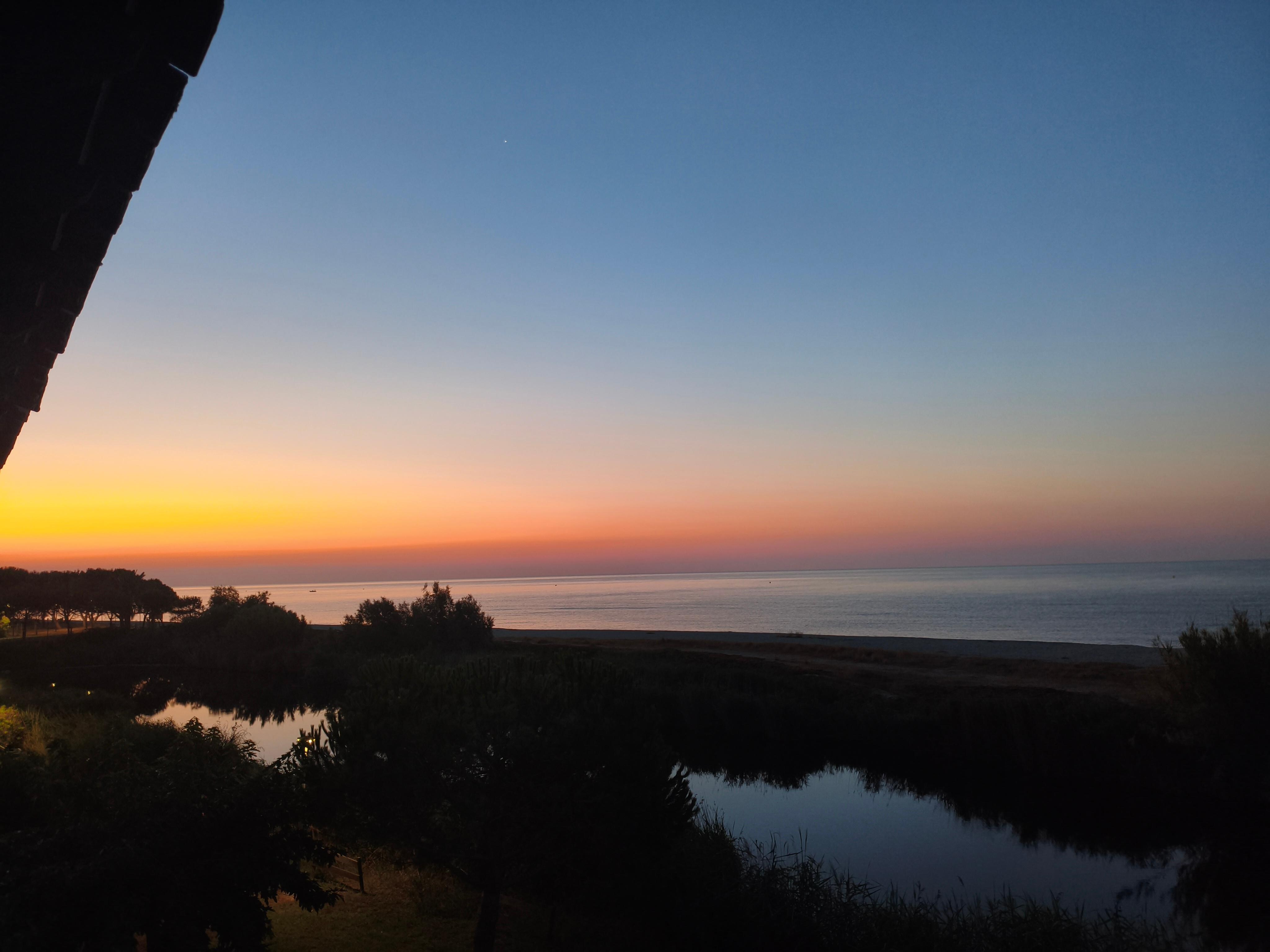 Blick vom Balkon bei Sonnenuntergang