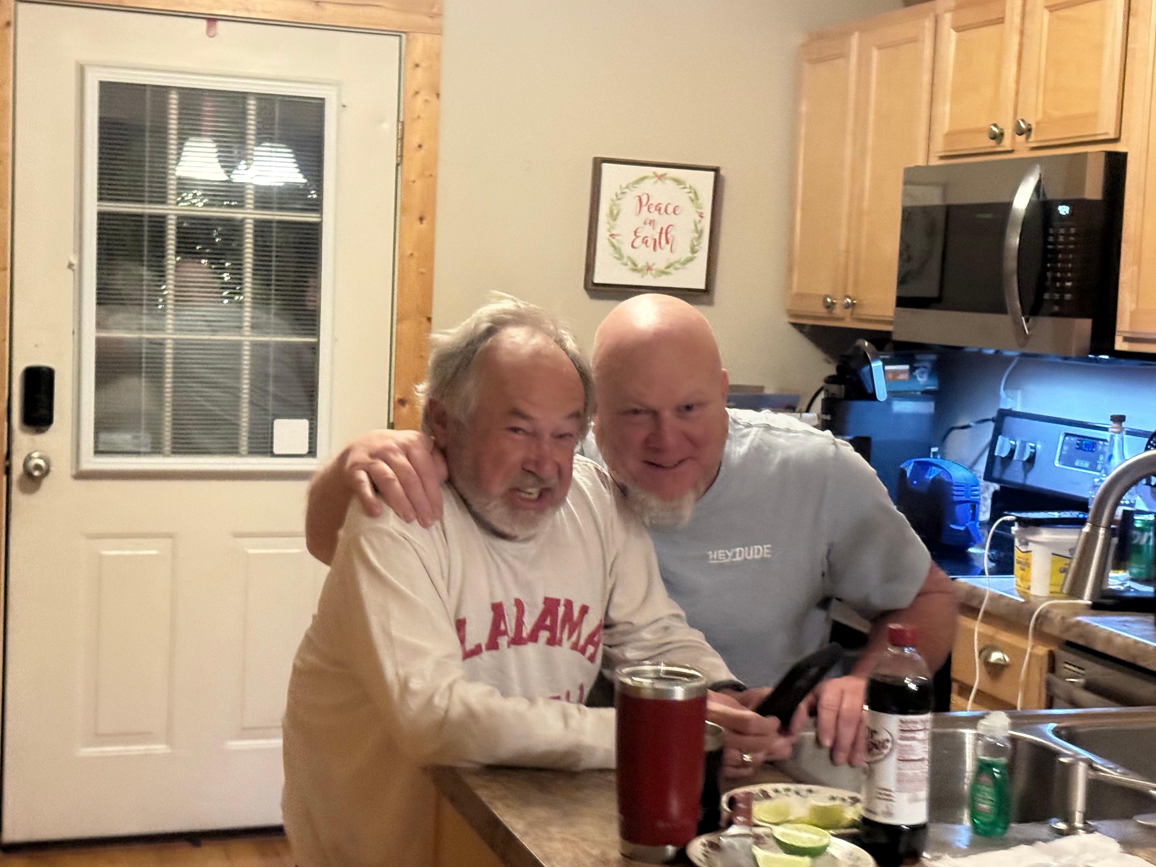 Butch & Joel enjoying dinner, music and drinks.