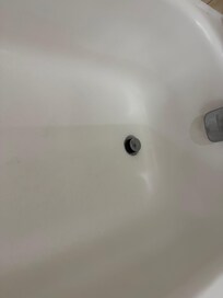 The dark ring around the bottom is scum, not a shadow