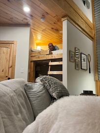 An adult can fit in the bunk.