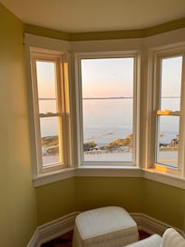 Perfect for enjoying a book and the water in the main bedroom