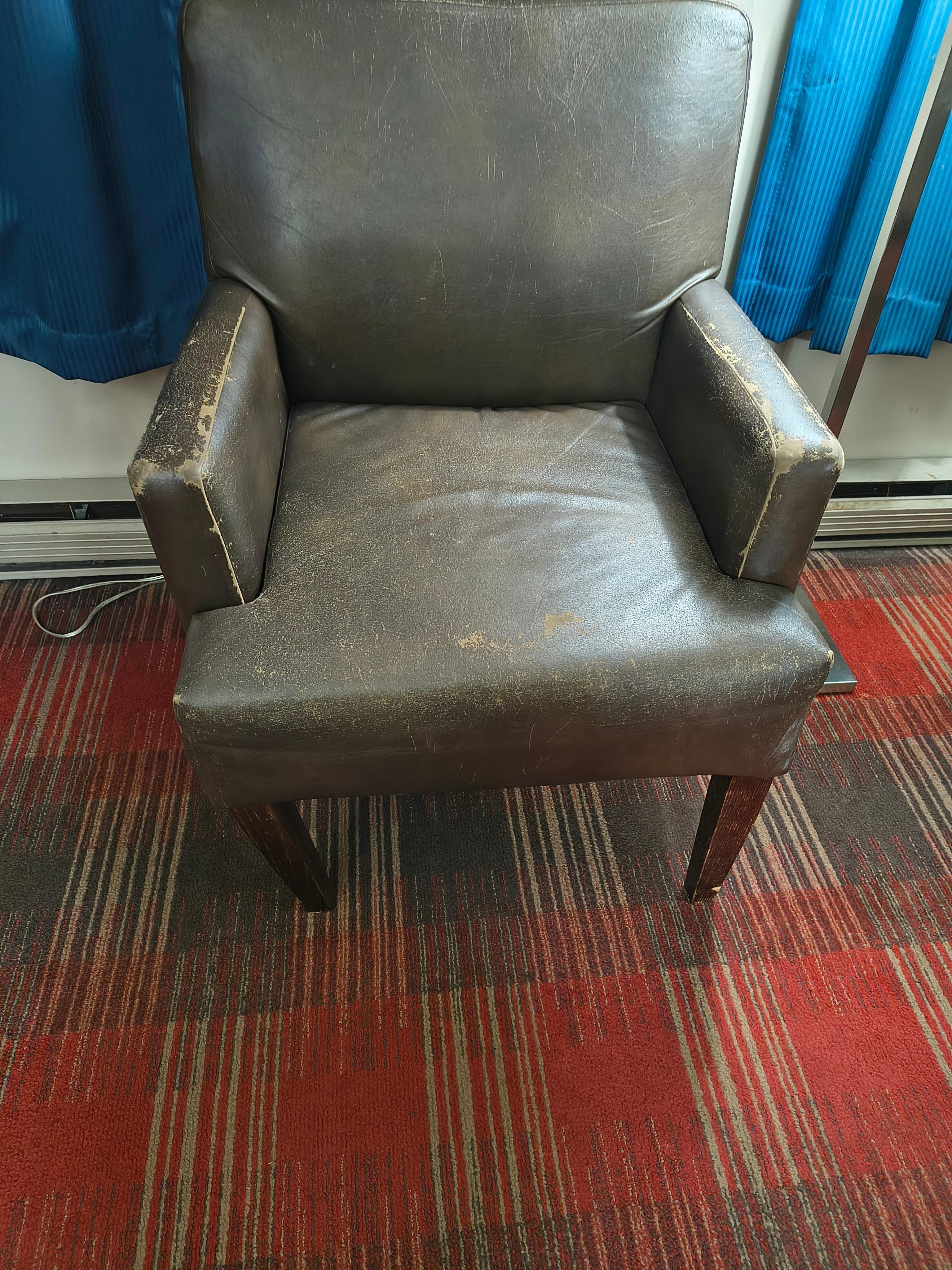 Broken chair we couldn't sit in.