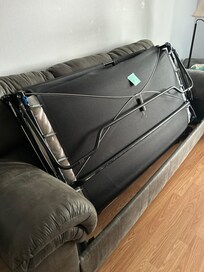 Broken couch. Had a sticky note to let us know.