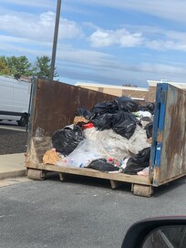 These dumpsters were on three areas outside that was not seen coming in the building