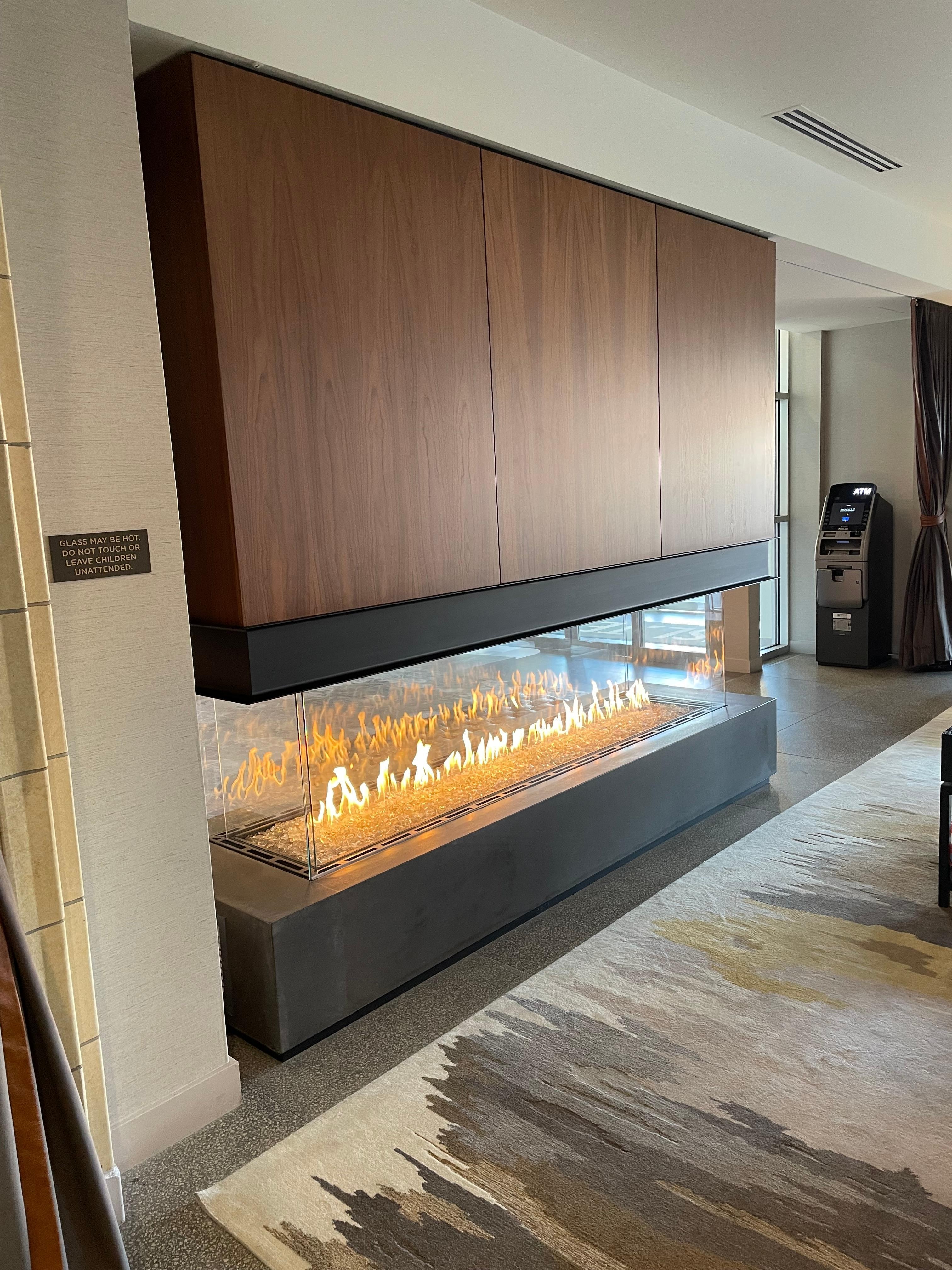 Beautiful fireplace between lobby and sitting area