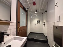 Clean, modern bathrooms down the hall!