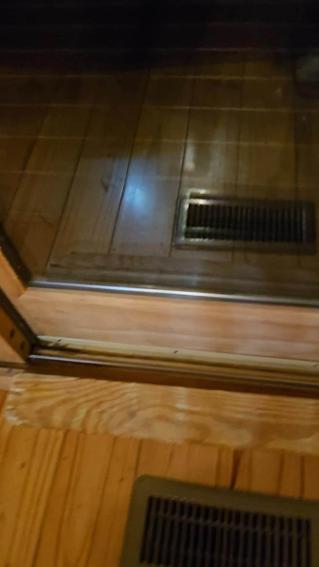 one of three sliding doors WITHOUT locks. I have a video of all the doors as well as the leaking ceiling but I can't upload them on this platform