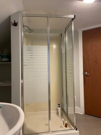 Secondary shower that was not listed on the listing had no glass door to shut and a huge hole that had been taped over with duct tape