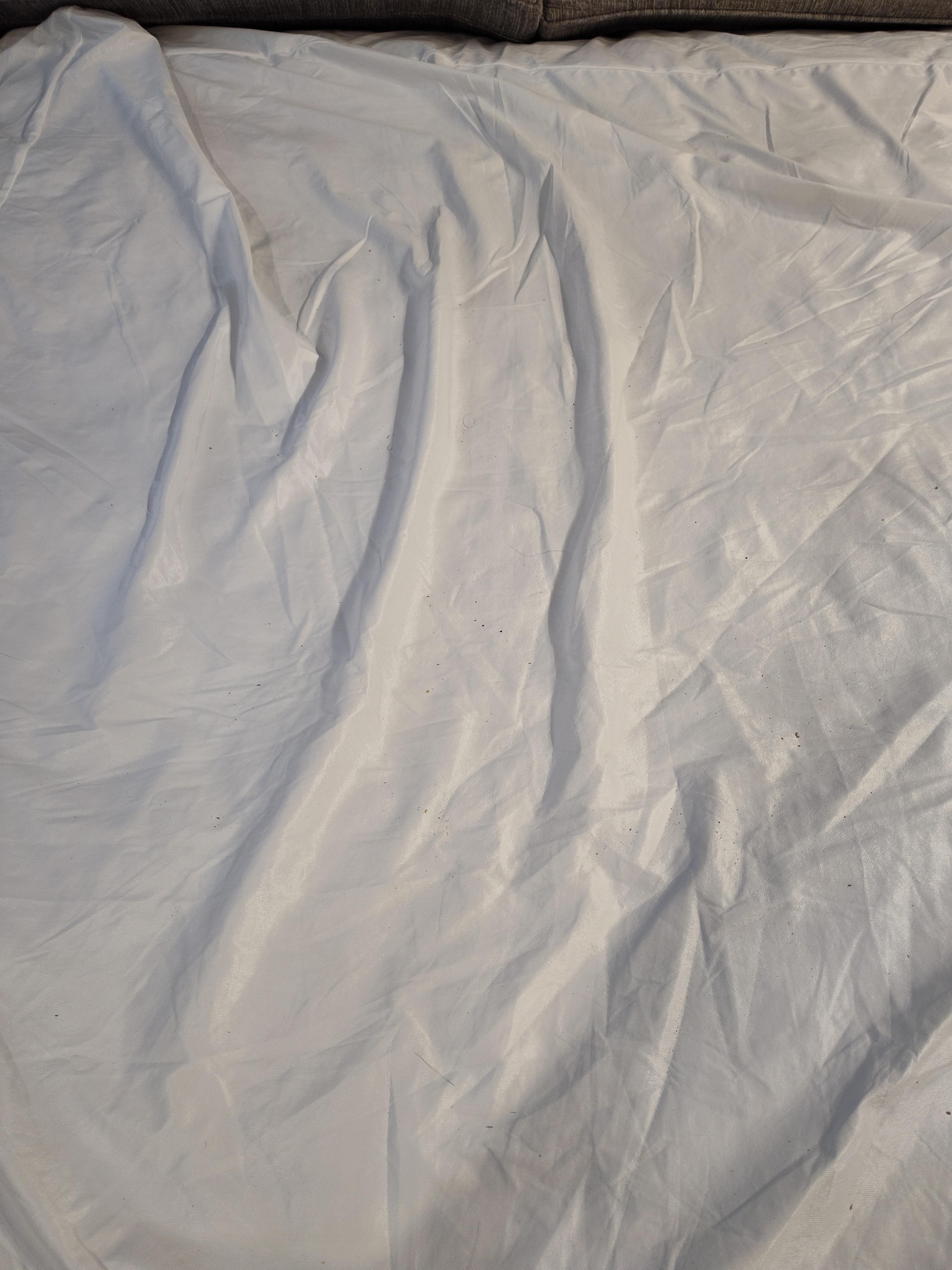 Dirt on plastic mattress protector on pull out sofa