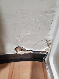 Unsealed hole in wall