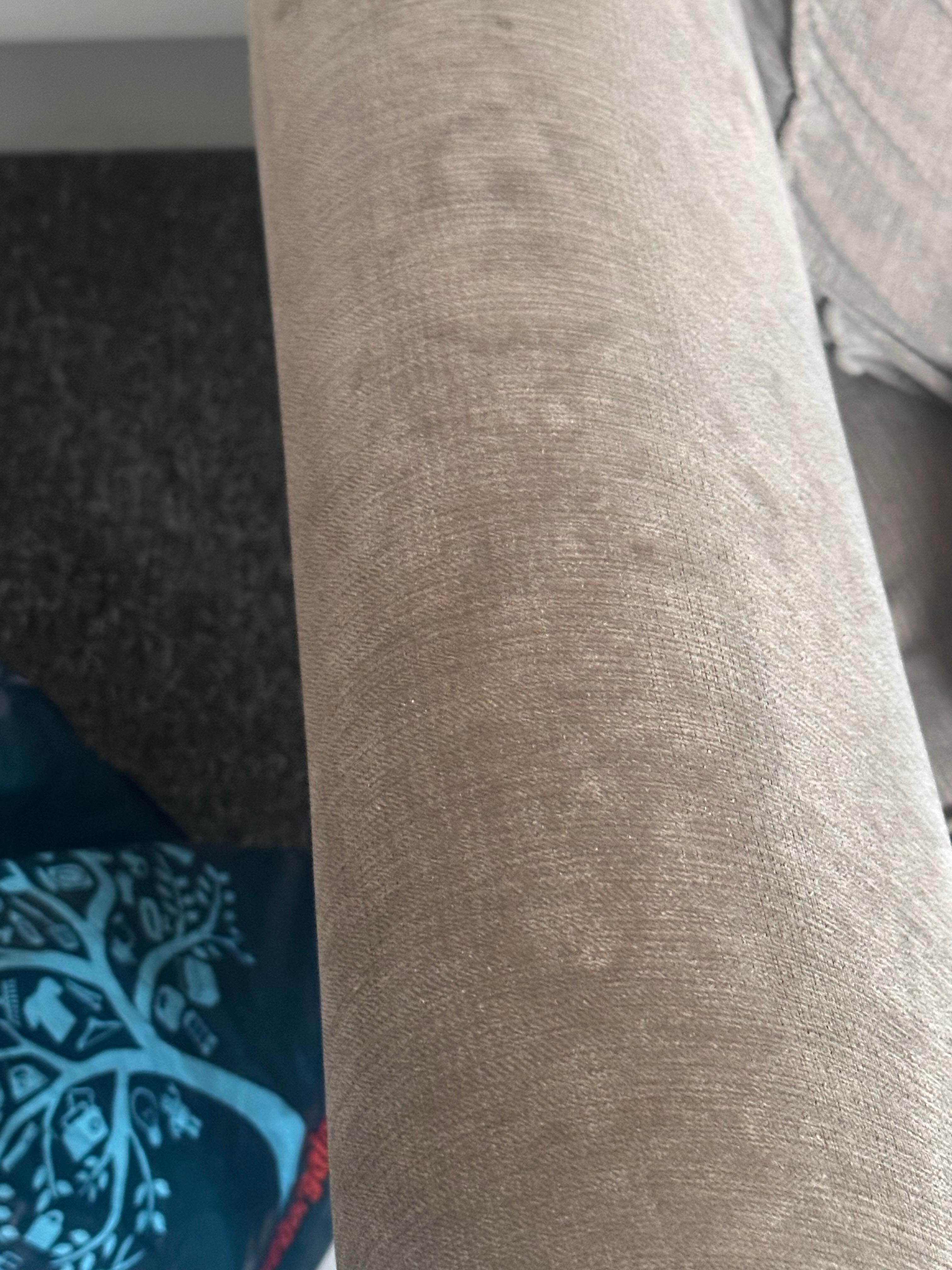 Arms of sofa