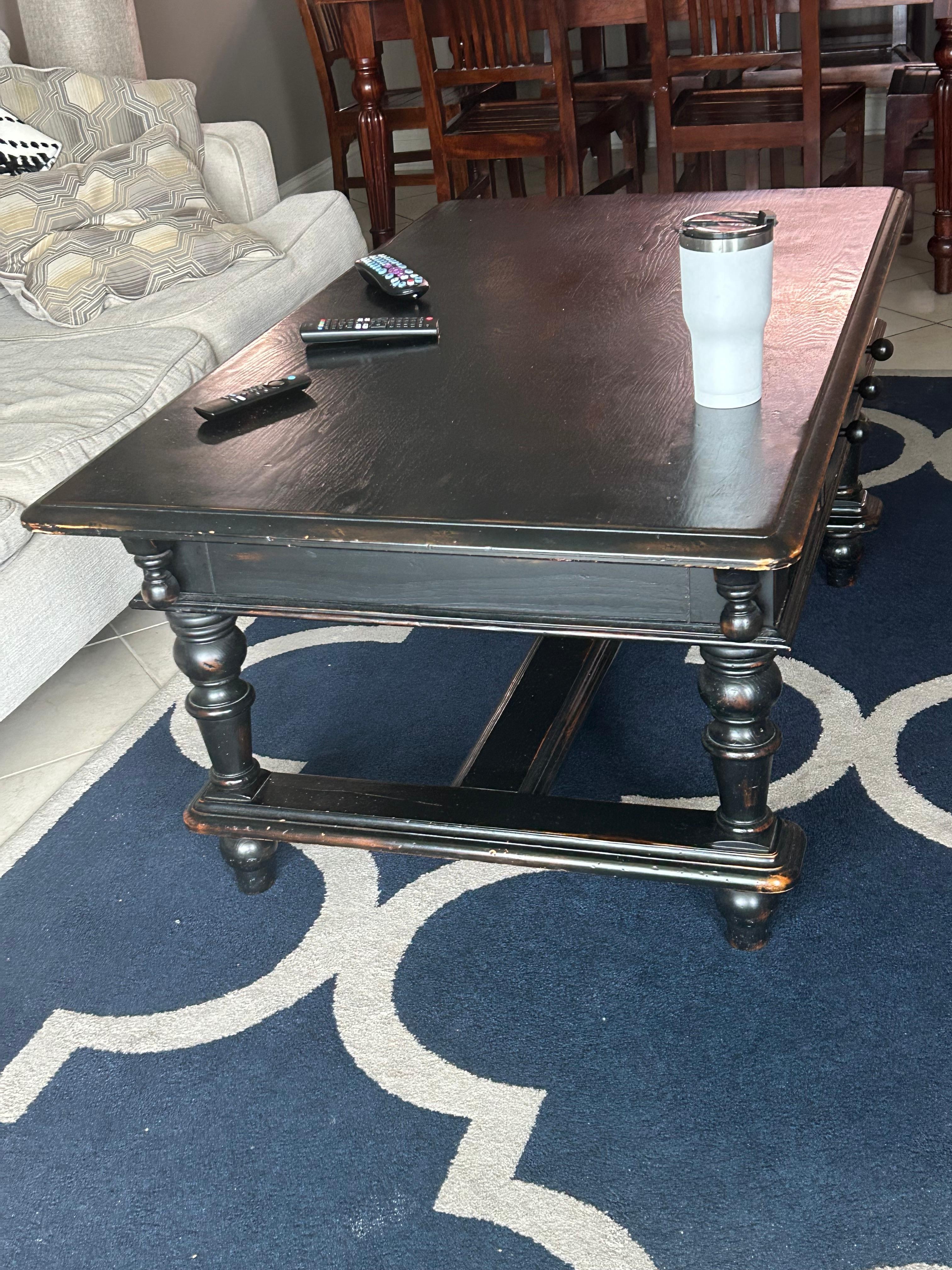 Rickety coffee table that my husband Jerry rigged so it wouldn’t wobble.