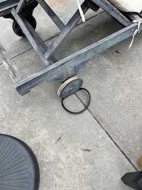 Entire chair wobbles side to side and wheels are loose