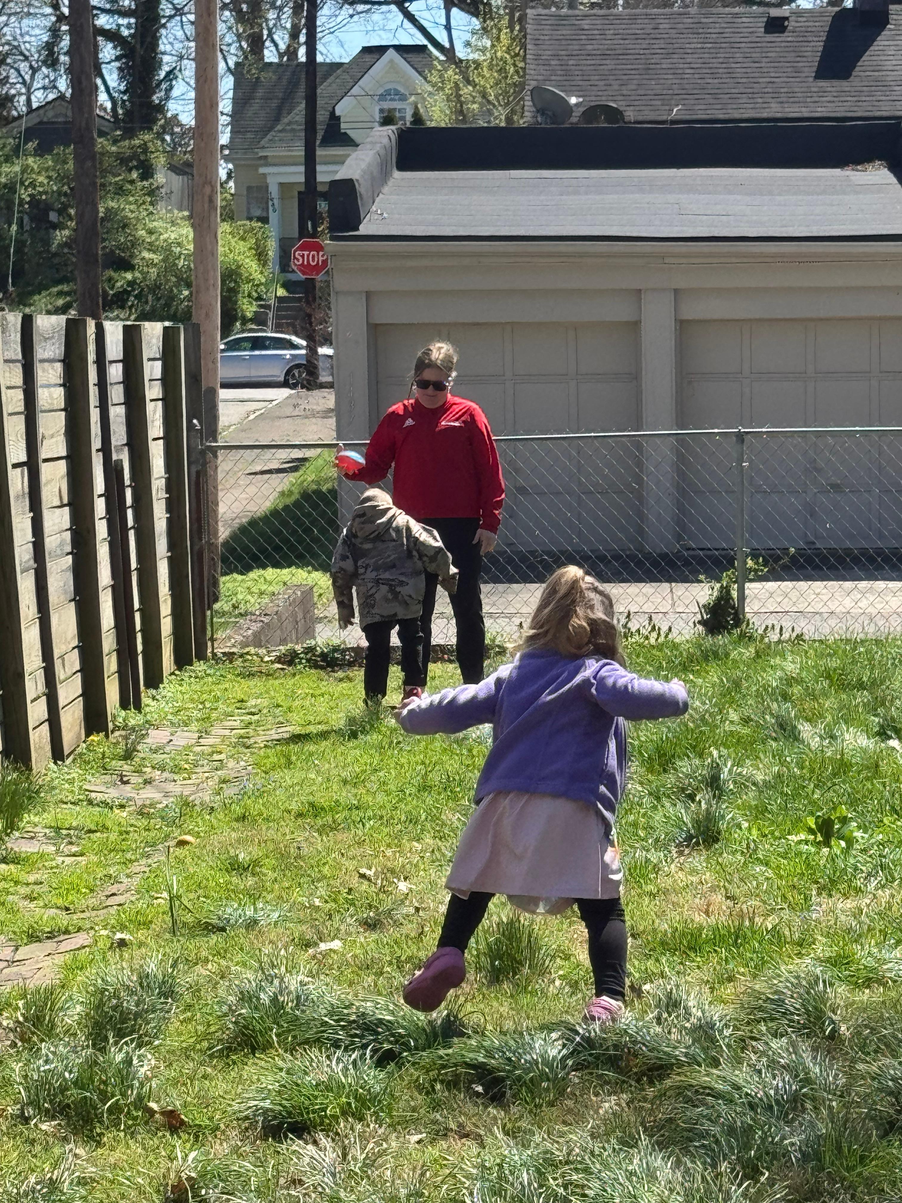 Playing in the back yard with the badminton game