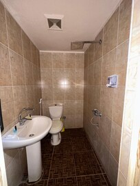 Right left side of the entrance. Rain shower (awesome). Bit as you can see…. All combined.  Water temperature awesome at any time.