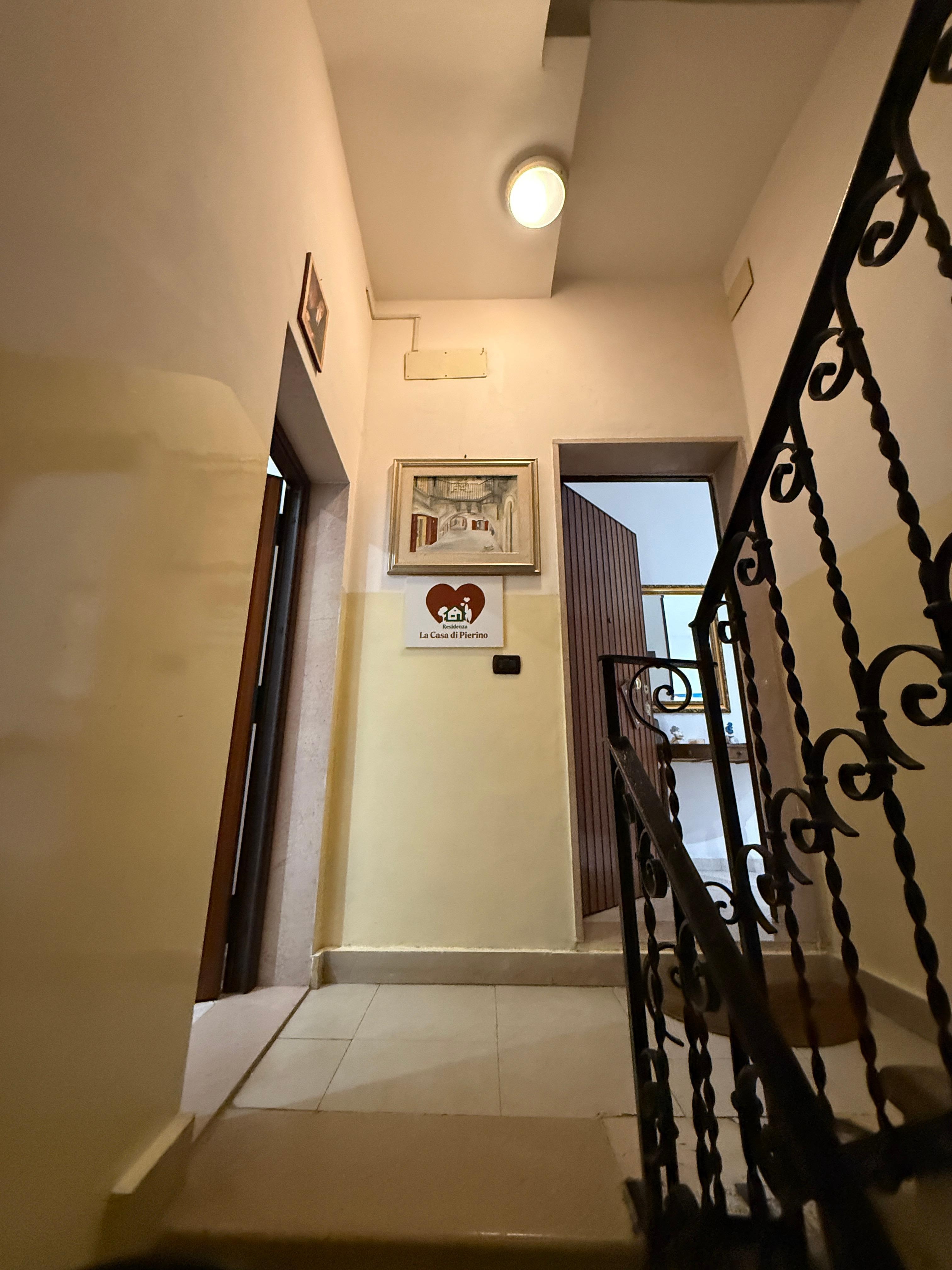 The doors to the bathroom/kitchen and the bedrooms 