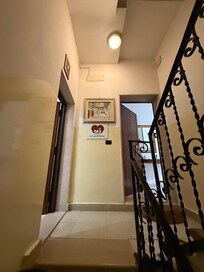 The doors to the bathroom/kitchen and the bedrooms