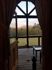 View from bedroom to the nice enclosed porch from the bed room