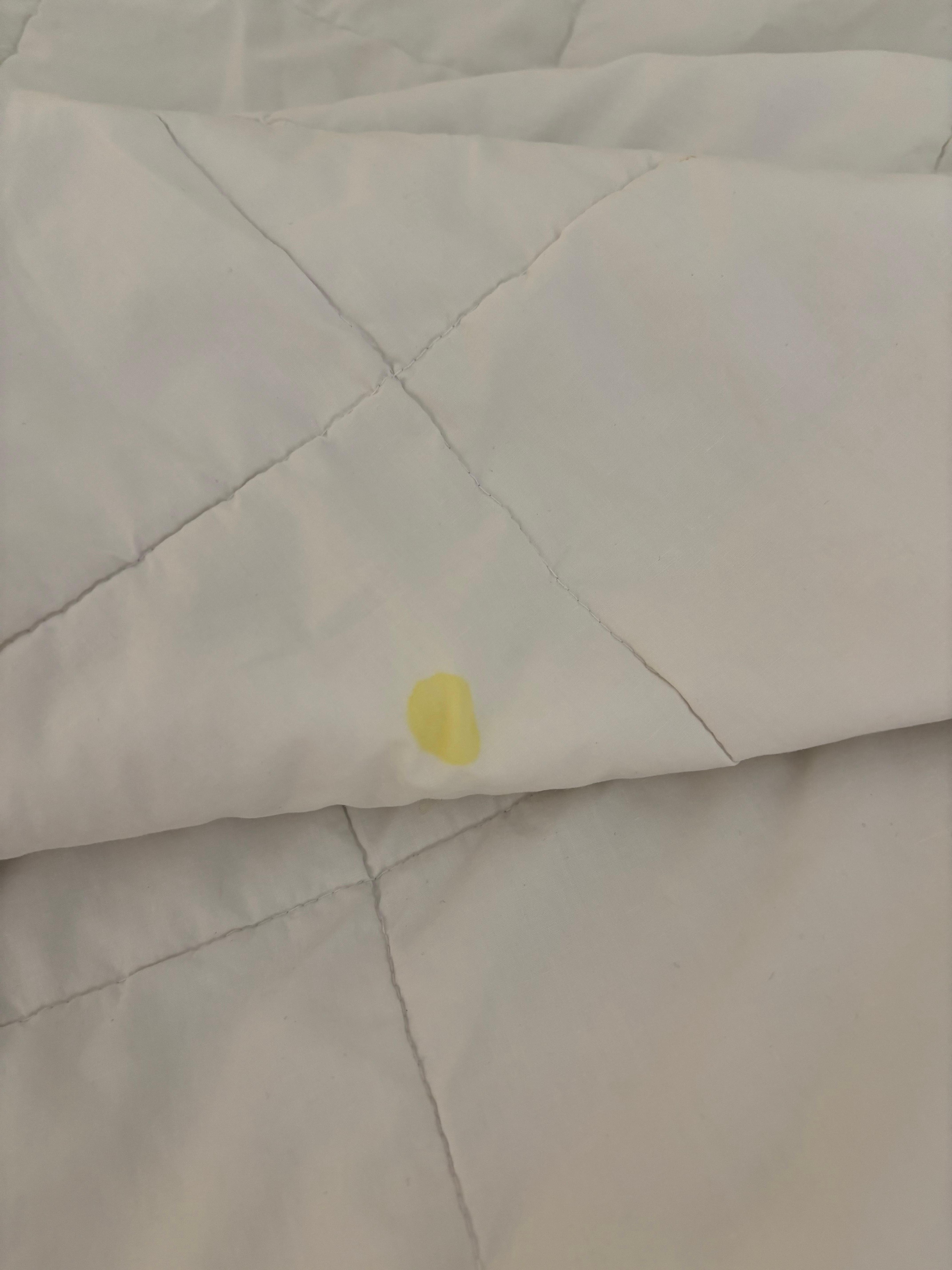 Yellow stain on a comforter 