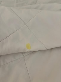 Yellow stain on a comforter