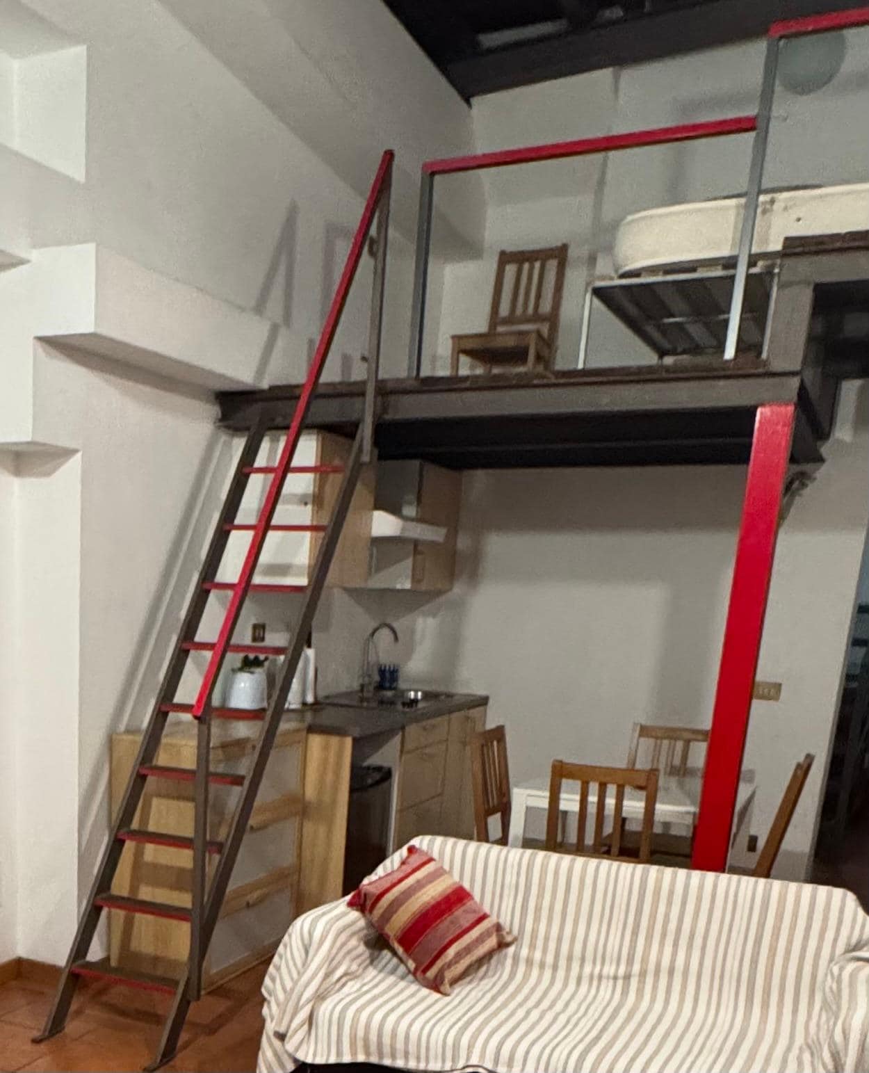 Ladder to loft—be aware of the narrow, steep and shallow steps particularly when descending.