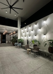 The entrance to the hotel is zen and beautiful! The restaurant attached is on the left