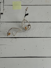 Wires sticking out of wall.