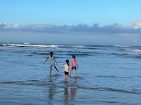 Grandkids loving the ocean.