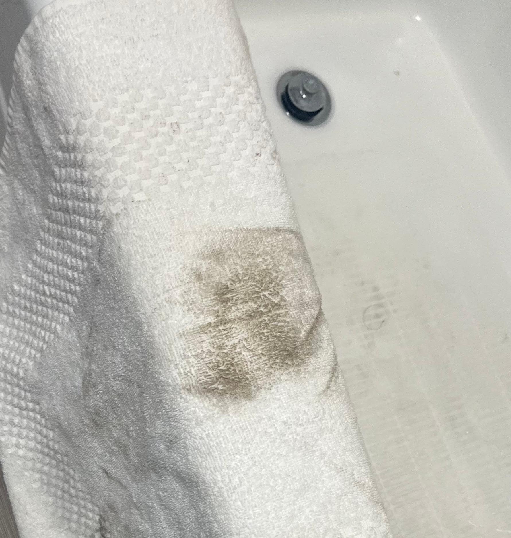 Bath mat that I used to wipe up water off floor 