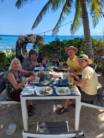 BBQ with friends beside the pool.